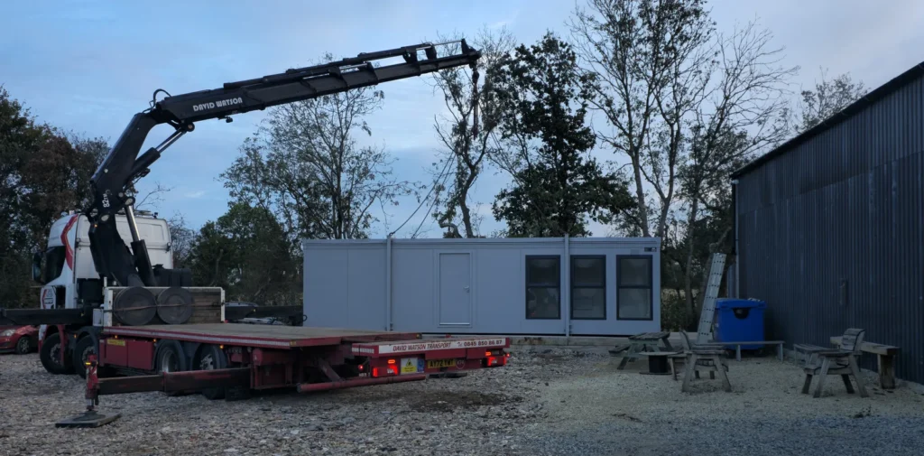 New office block being craned into place.